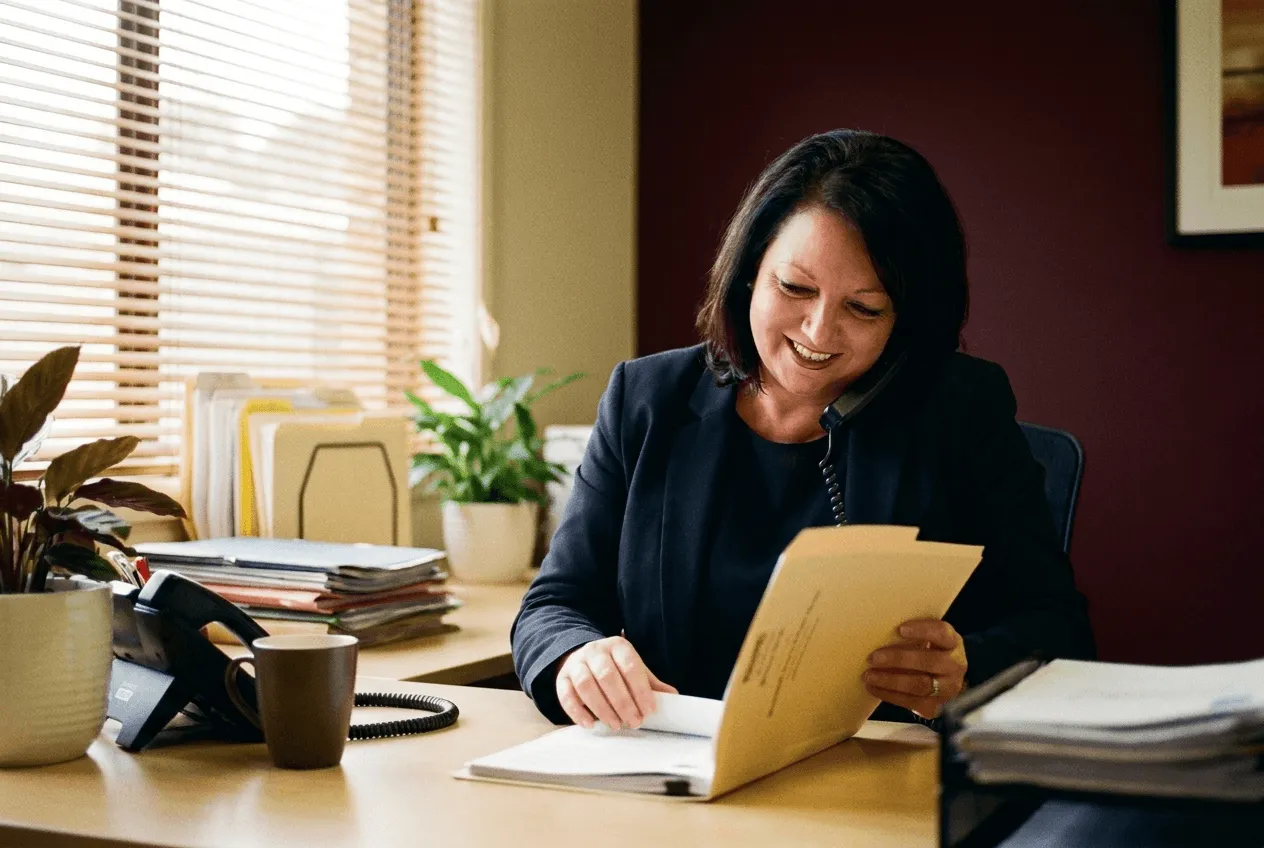 Tudor Finance team managing loan paperwork and lender follow-ups